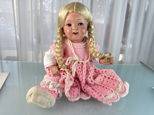 Poupée tête porcelaine