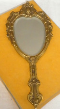 Ancien miroir face à main en bronze XIXème miroir biseauté fleurs jolie décor