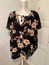 Haut manches courtes taille 44 bleu marine motifs fleurs comme neuf