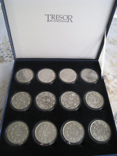 Coffret de 12 Médailles écu de 1982 à 1993 sous capsules