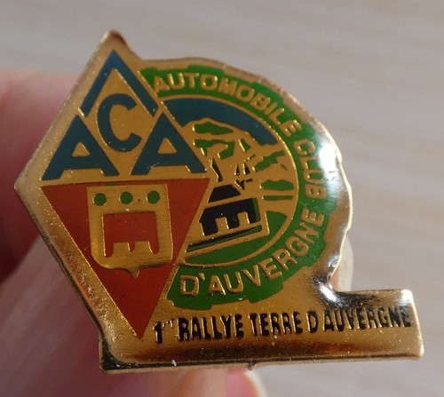 Pin rallye terre - pin's,