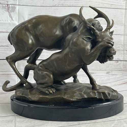Lion hunting gazelle - lion, bronze