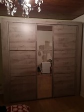 armoire de chambre adulte couleur bois 3 portes dont une vitrée marque Sarlat