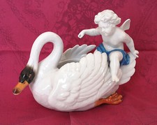 Angelot sur cygne - sur, un