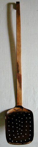 Ancienne ecumoire tout - ancienne,