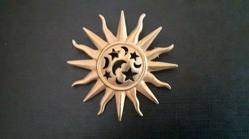 Broche soleil ancienne astres