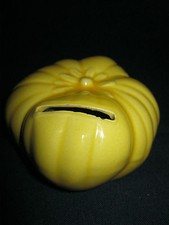 ANCIENNE TIRELIRE SAINT CLEMENT EN FORME DE POTIRON.