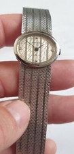 MONTRE FEMME SUISSE MADE SWISS  SANDOZ A QUARTZ EN ACIER ANNEES 2000