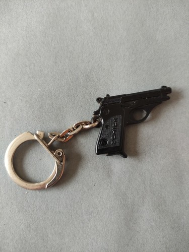Superbe porte cle pistolet - superbe,