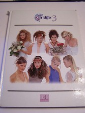 LIVRE PROFESSIONNEL DE LA COIFFURE EN 5 LANGUES . SPECIAL CHEVEUX LONGS .