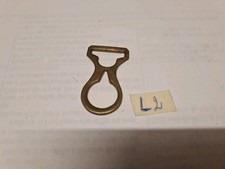 Pièce laiton de jugulaire de