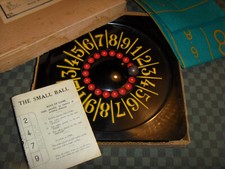 Ancien jeu de la boule en BAKÉLITE noire en boite notice - style casino roulette