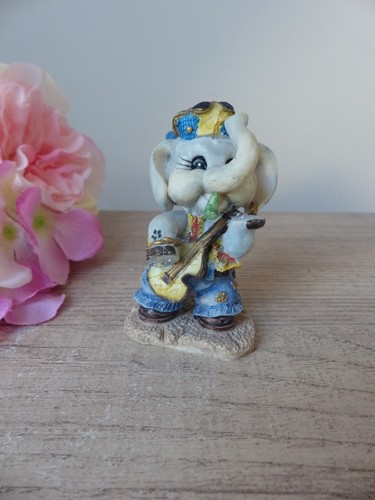 Figurine éléphant musicien