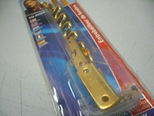 Entrebailleur de fenêtre deux vantaux 20 cm acier doré