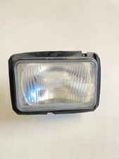 Phare avant Suzuki 125 TSR -