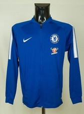 ^ Veste de survêtement