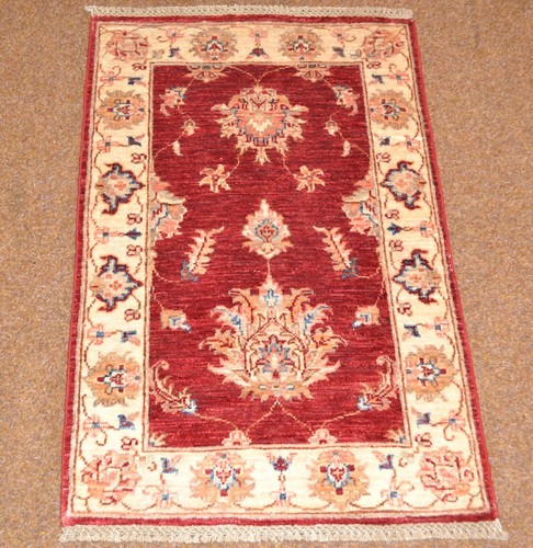 Tapis oriental tissé la - À,