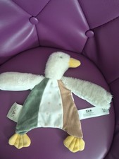 Tape à l'oeil doudou peluche