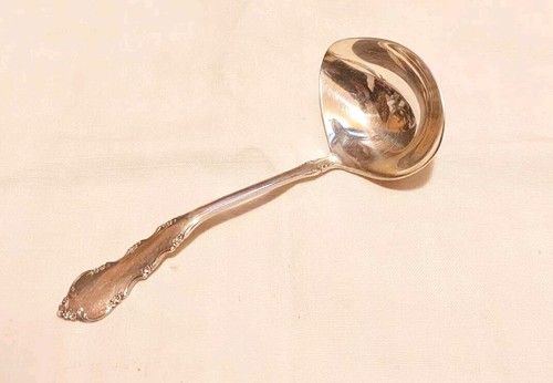Cuillère sauce métal - a,
