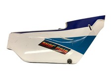 Cache carenage sous selle