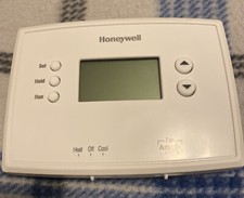 Honeywell MD: 1935 5-2 Day Programmable Thermostat (RTH221B1039) Used But Good.