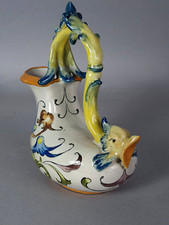 Curieuse verseuse faïence