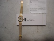 montre LIP "Classic" dorée bracelet femme neuve en boite pile neuve