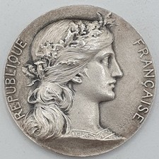 Médaille (Argent) : Offerte