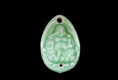 Pendentif porte bonheur - ou, porte-bonheur