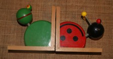 Serre livres jouet Vilac en bois Coccinelle Grenouille tête ressort