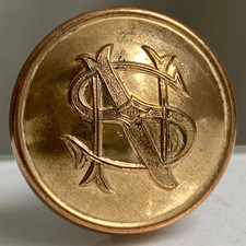 Bouton ancien 18 mm - Laiton NS Nord Sud 1920 LA BELLE JARDINIERE PARIS