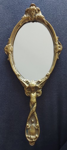 Ancien miroir face - face, À
