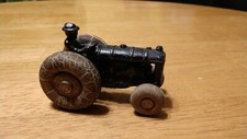 Vintage Cast Iron black Toy Tractor w original rubber tires
