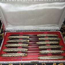 set de 11 couteaux vintage anciens Pradel inox dans leur coffret 