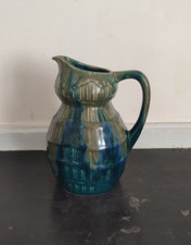 Pichet bilobé en faïence