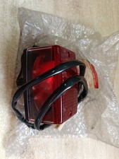 UN FEU ARRIERE ORIGINE NEUF MOTO SUZUKI TS50 X 1984 A 1994 35710-13630