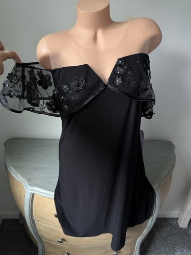 Black floral applique off - applique,