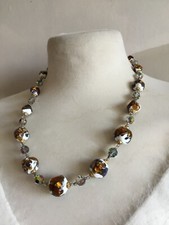 Ancien collier perles de verre Murano mordoré/blanc en très bon état.