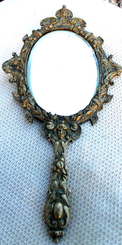 Ancien face main bronze - en,