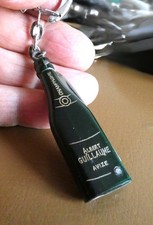 Ancien porte clé Bouteille