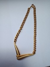 Monet ancien collier métal doré et laqué beige