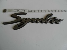 ORIGINE MONOGRAMME LOGO SIGLE EMBLÈME DE PORTE PORTIÈRE PEUGEOT 306 SYMBIO