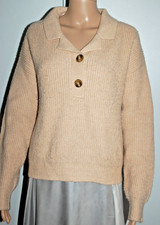 Pull beige deux boutons col