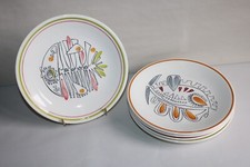 5 assiettes plates en faïence