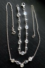 Ensemble collier et bracelet or blanc 750 avec saphirs et pierres de lune