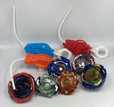 Hasbro BEYBLADE lot 6 Toupies Diverses (Burst Métal Fusion) + 3 Lanceurs