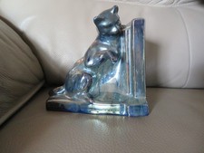 serre livre chat en faïence