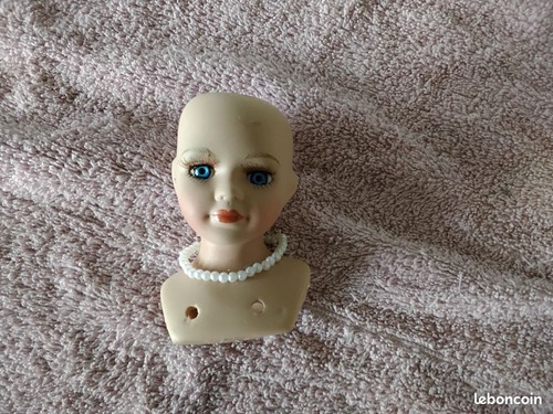 Tête poupée porcelaine - de,