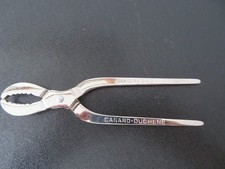 NEUVE  PINCE A BOUCHON DE