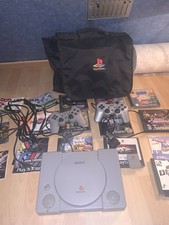 Lot PlayStation 1 SCPH-5502 +Manette , Ct. Memoire jeux notices et sac d’origine